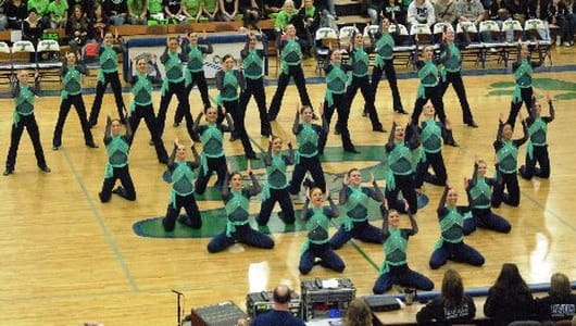 The Lightning Dance Team performing at a basketball game.